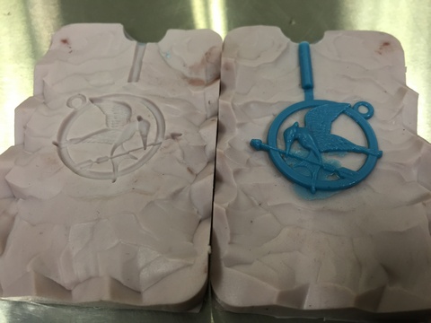 Wax pattern of mockingjay pendant