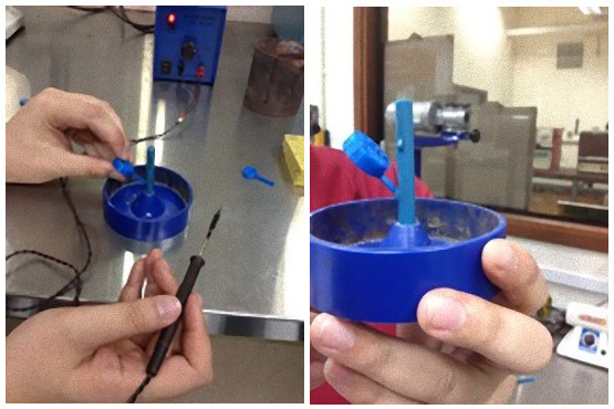 Sprue base with wax pattern