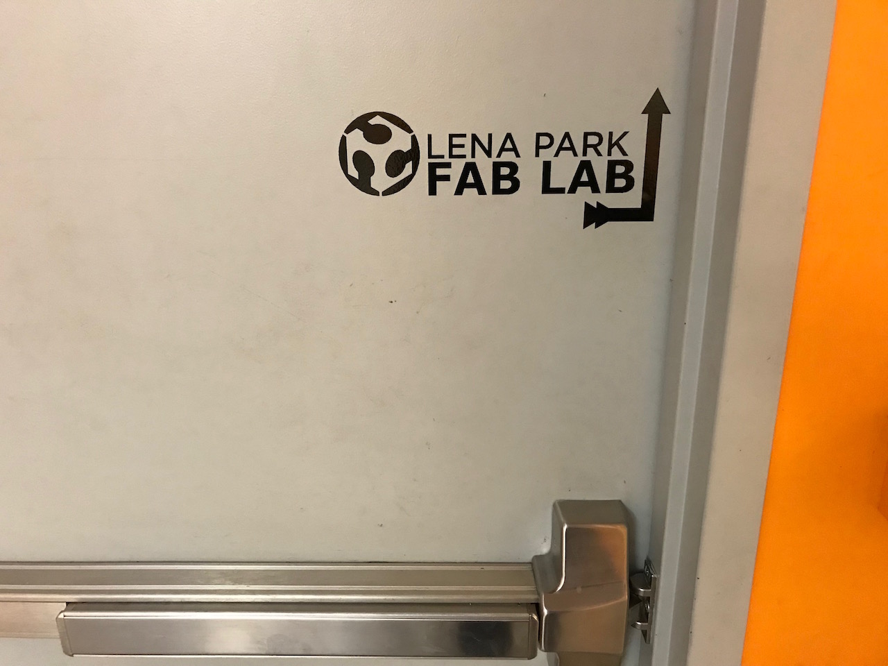 Sticker in place on door