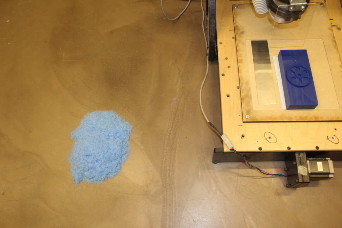 Waste machinable wax in a neat pile before being put in a bag