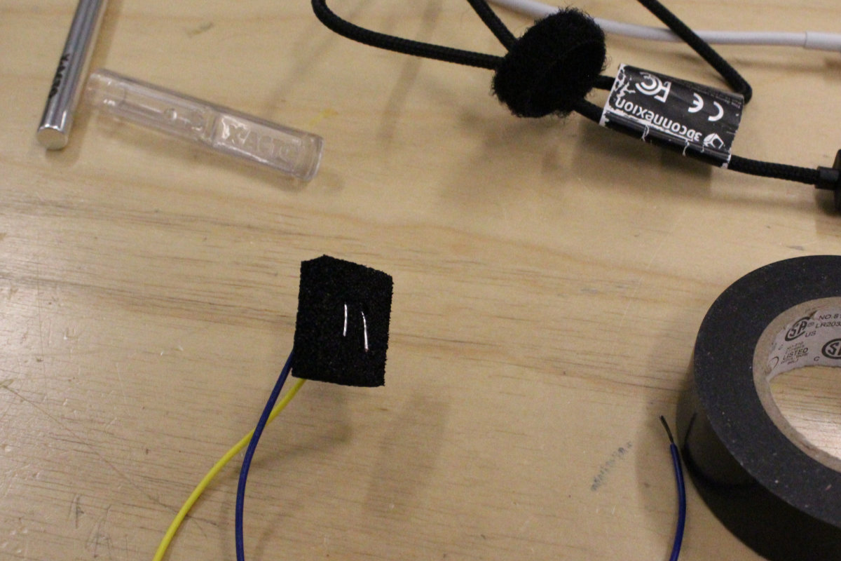 The bent wires against the foam