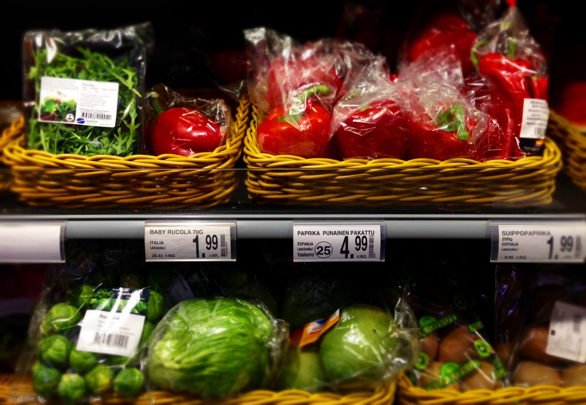 Shelves stocked with tasty plastic covered fruit and veg!