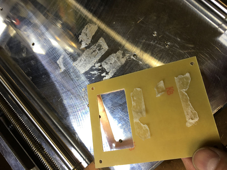 3 stripes of double-sided tape sticked the board to the workbench