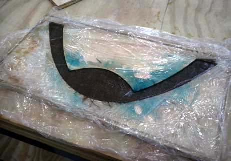 Forged composite plate