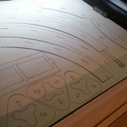 Sheet for laser cutting part of arcade