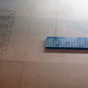 Putting extra weight before laser cutting to better fixate the cardboard