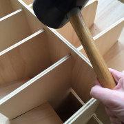 Hammering the last bits to ensure a tight fit