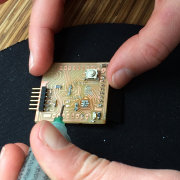 Applying solder paste to fix microcontroller fabkit