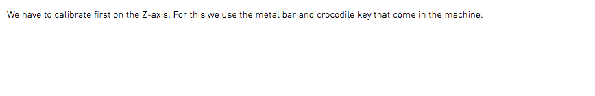 We have to calibrate first on the Z-axis. For this we use the metal bar and crocodile key that come in the machine. 